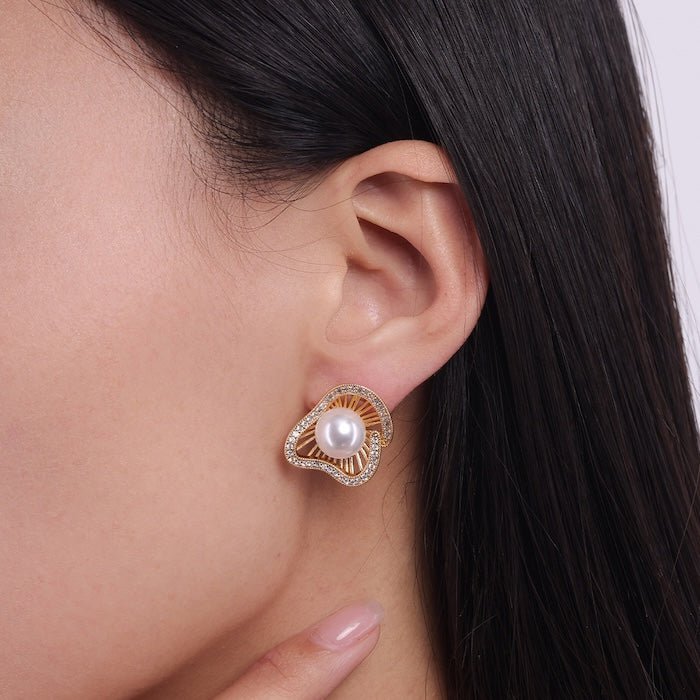 Lotus Design sprankelende pareloorbellen en ringen