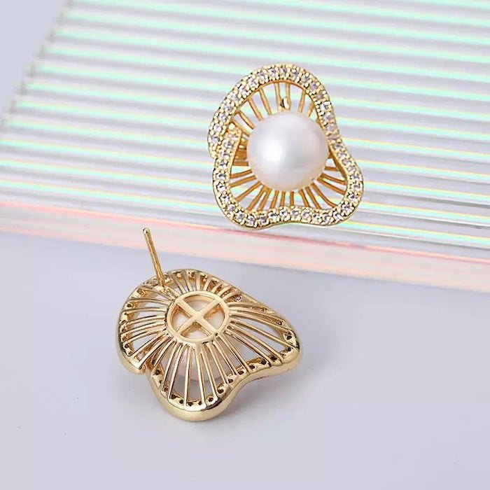 Lotus Design sprankelende pareloorbellen en ringen