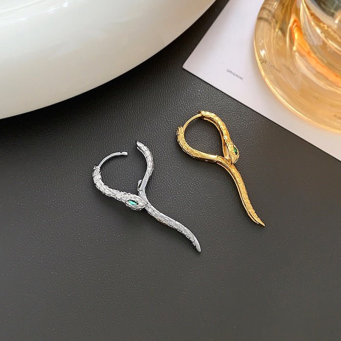 Unieke Green-eye Cobra Design oorbellen - goud en zilver
