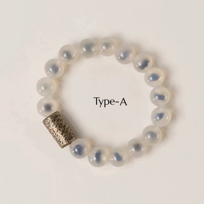Snoep Agaat kralenarmband met bronzen bedel