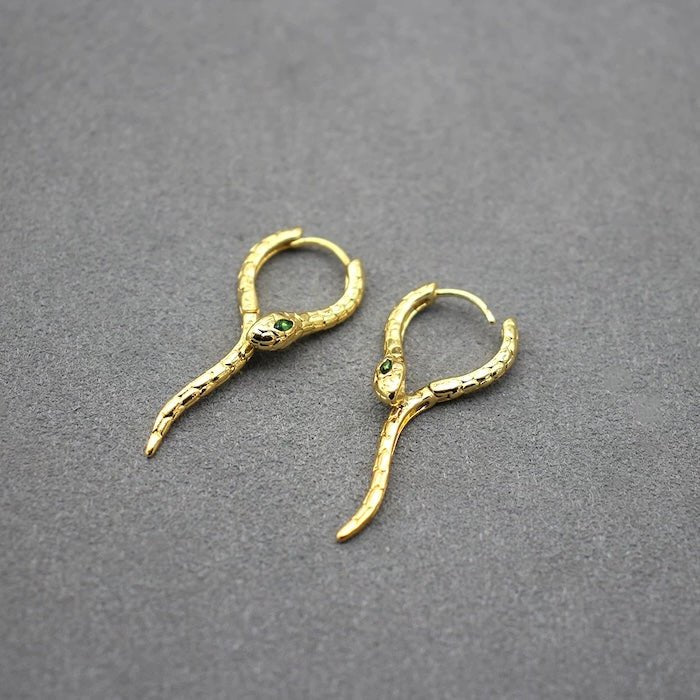 Unieke Green-eye Cobra Design oorbellen - goud en zilver