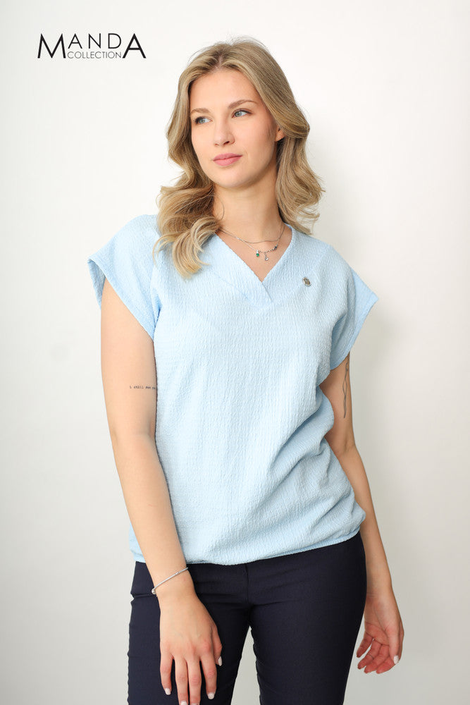Light blue top