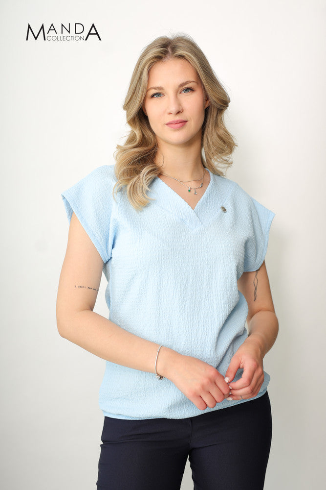 Light blue top