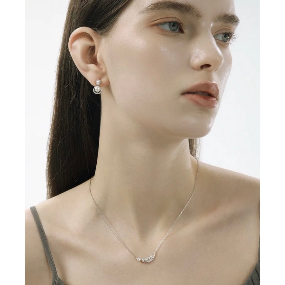 Elegante glimlach parelketting