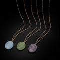 Botanische parelmoer medaillon ketting