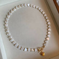 Parelmoer hart charme ketting