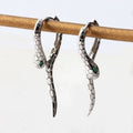 Unieke Green-eye Cobra Design oorbellen - goud en zilver