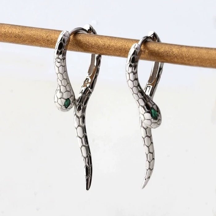 Unieke Green-eye Cobra Design oorbellen - goud en zilver