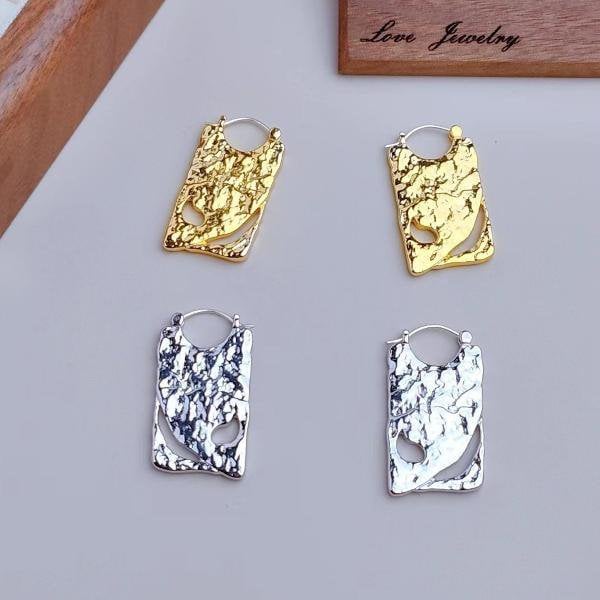 Unieke borddruppeloorbellen - goud en zilver