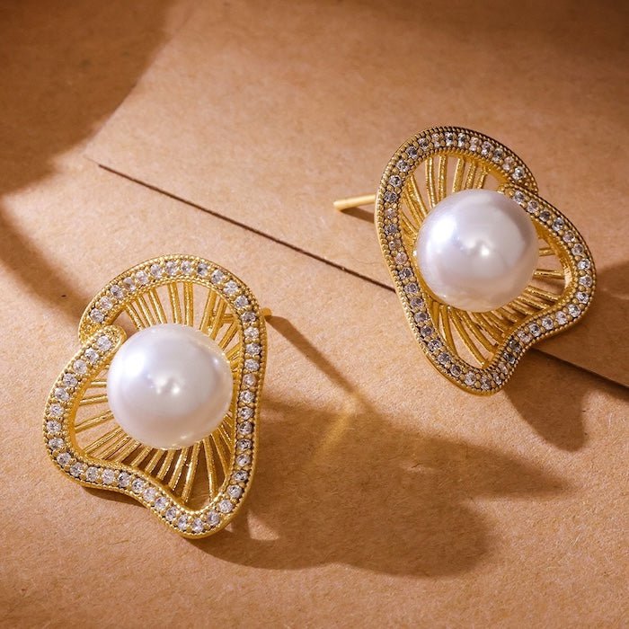Lotus Design sprankelende pareloorbellen en ringen