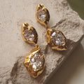 Gesmolten gouden kristallen drop oorbellen
