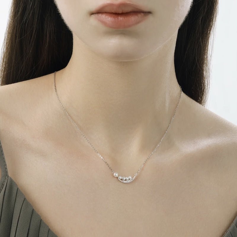 Elegante glimlach parelketting