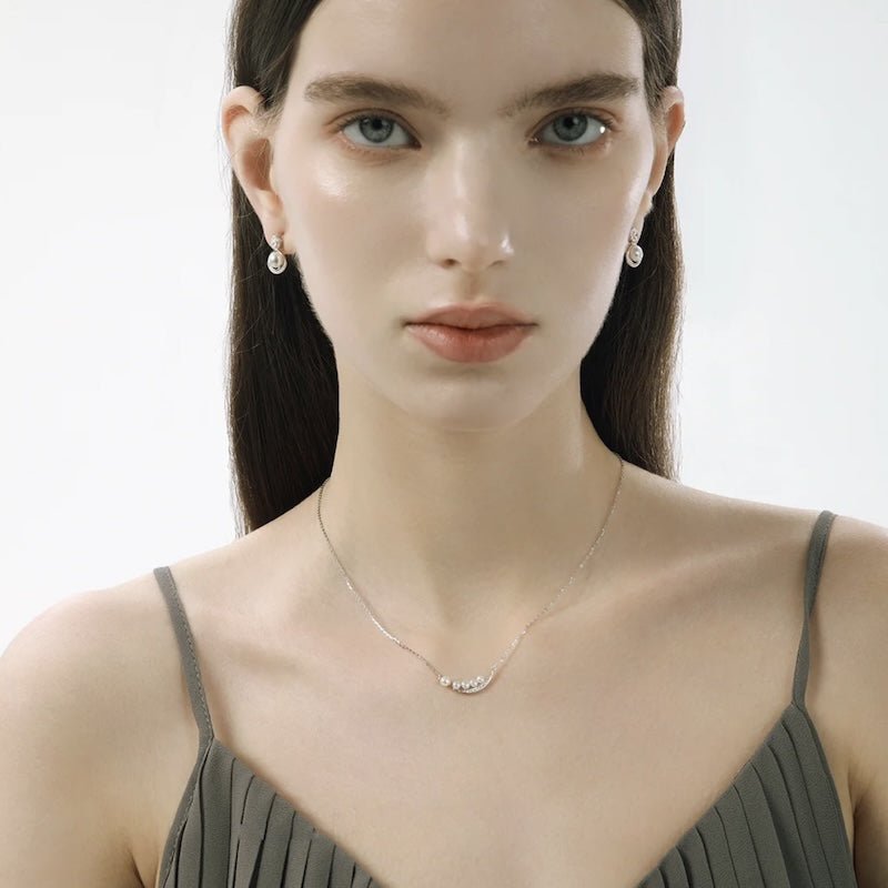 Elegante glimlach parelketting