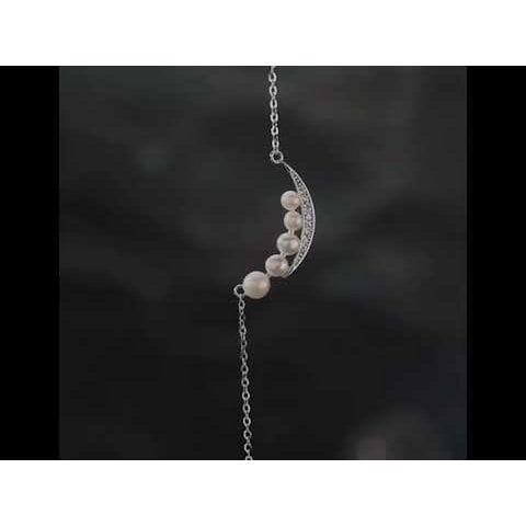 Elegante glimlach parelketting