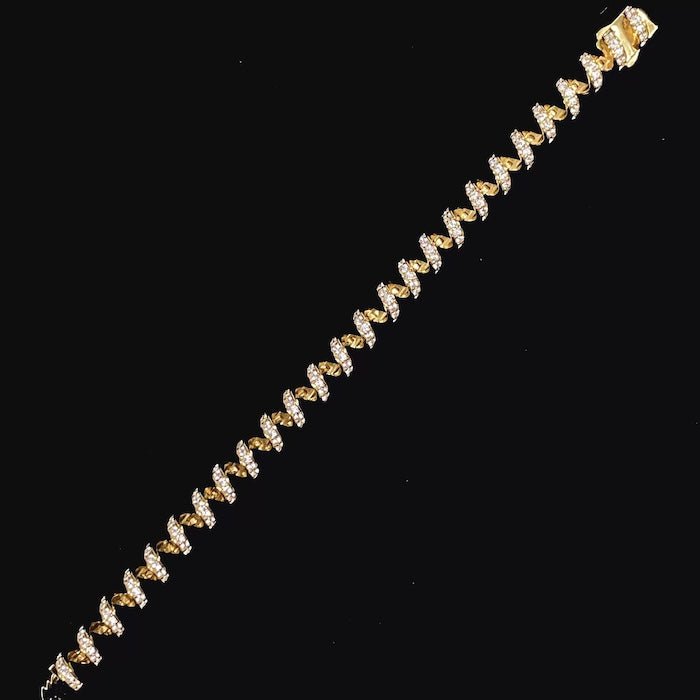 Oogverblindende spiraalvormige link statement armband