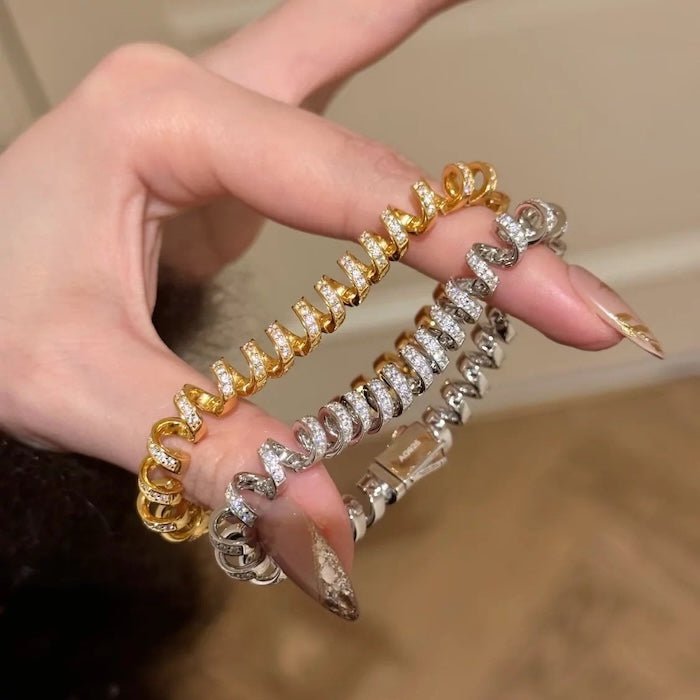 Oogverblindende spiraalvormige link statement armband