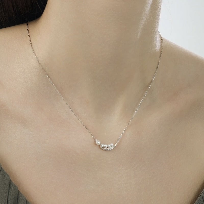 Elegante glimlach parelketting