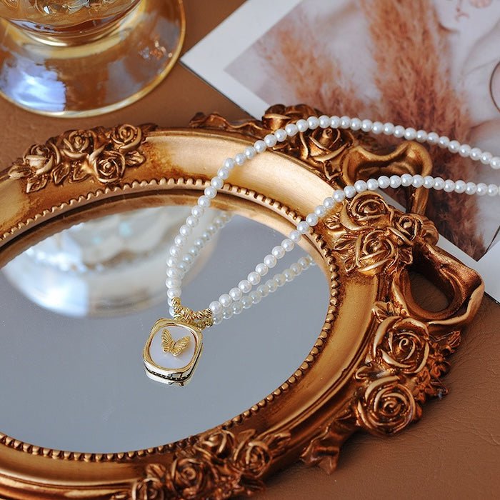 Parel kralen vlinder hanger ketting