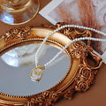 Parel kralen vlinder hanger ketting