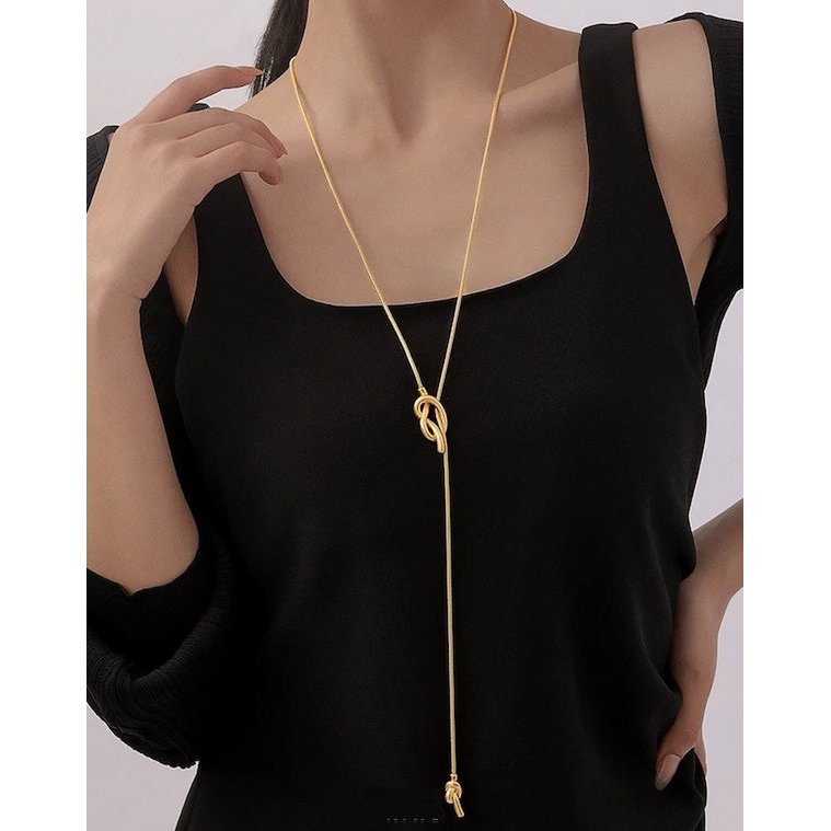 Minimalistische knoop trui ketting