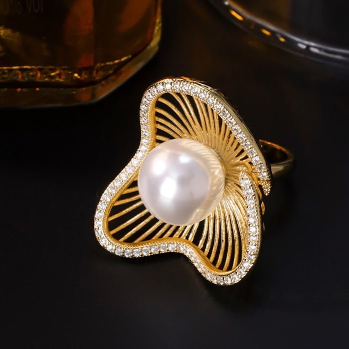 Lotus Design sprankelende pareloorbellen en ringen