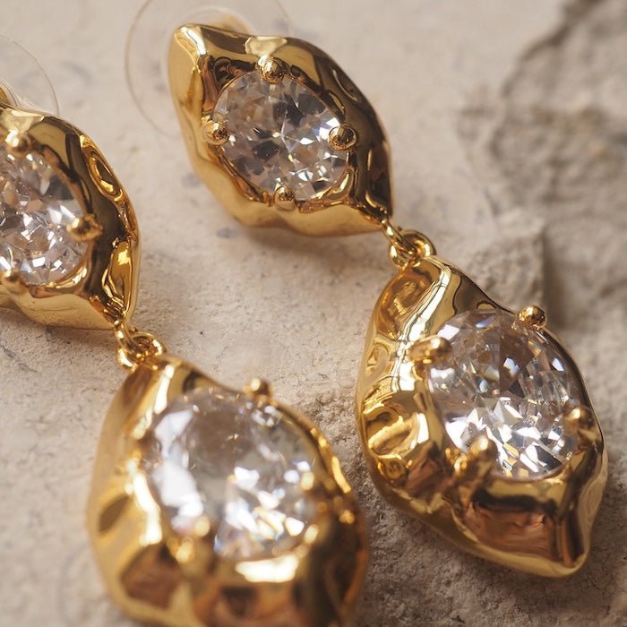 Gesmolten gouden kristallen drop oorbellen