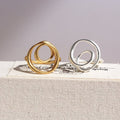 Minimalistische Swirl Line Ring - Goud en zilver