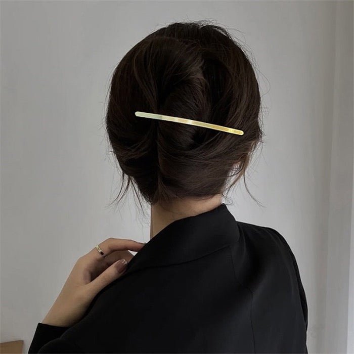Minimalistische metalen haarclip met één regel