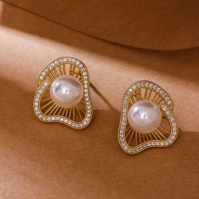 Lotus Design sprankelende pareloorbellen en ringen