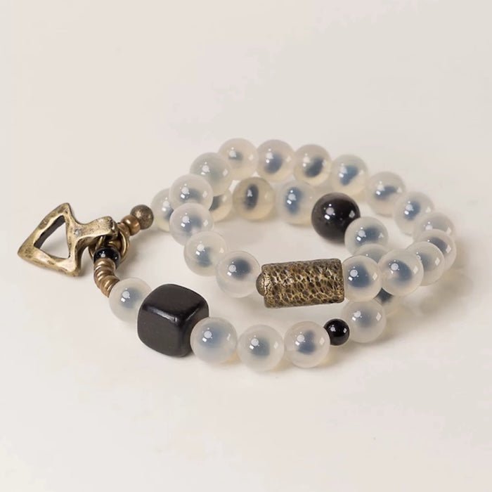 Snoep Agaat kralenarmband met bronzen bedel