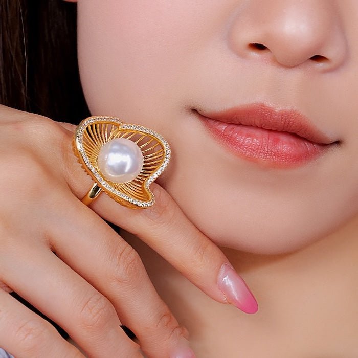 Lotus Design sprankelende pareloorbellen en ringen