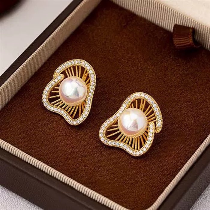 Lotus Design sprankelende pareloorbellen en ringen