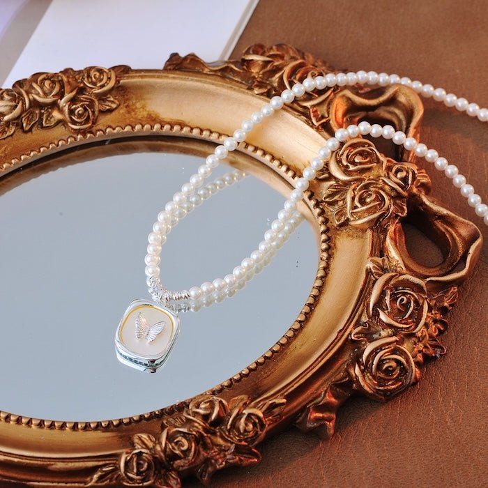 Parel kralen vlinder hanger ketting