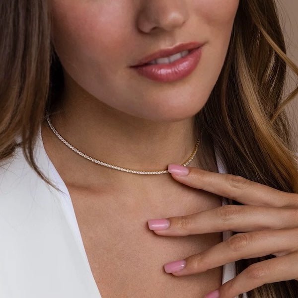 Tijdloze Rivière-chokerketting met diamantlook