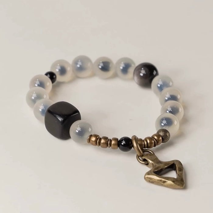 Snoep Agaat kralenarmband met bronzen bedel