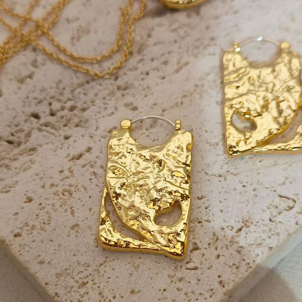 Unieke borddruppeloorbellen - goud en zilver
