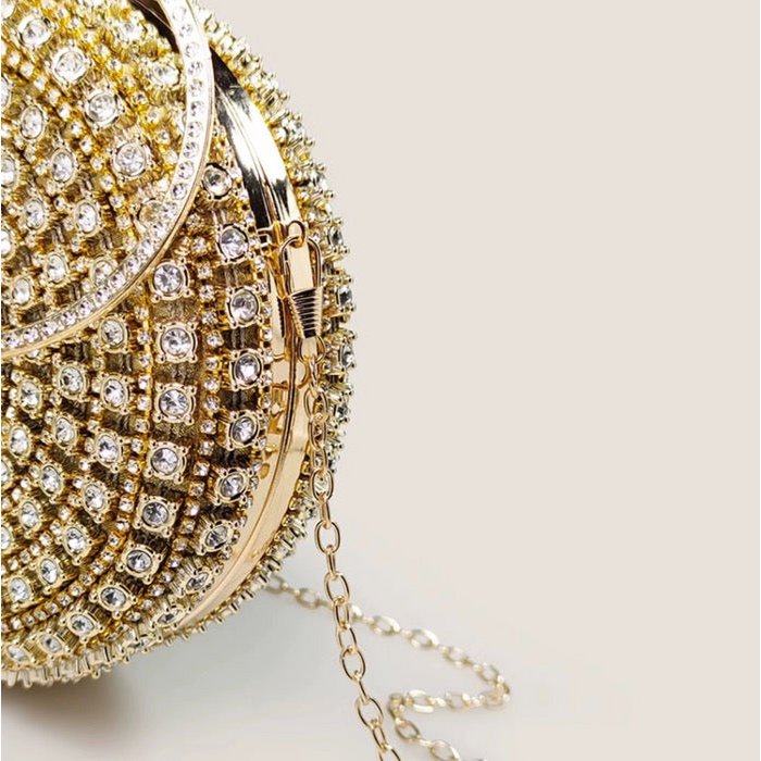 Oogverblindende ronde clutch met diamantlook