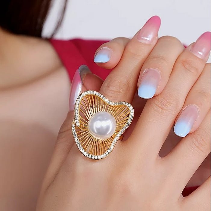 Lotus Design sprankelende pareloorbellen en ringen