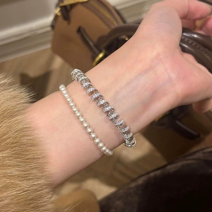 Oogverblindende spiraalvormige link statement armband